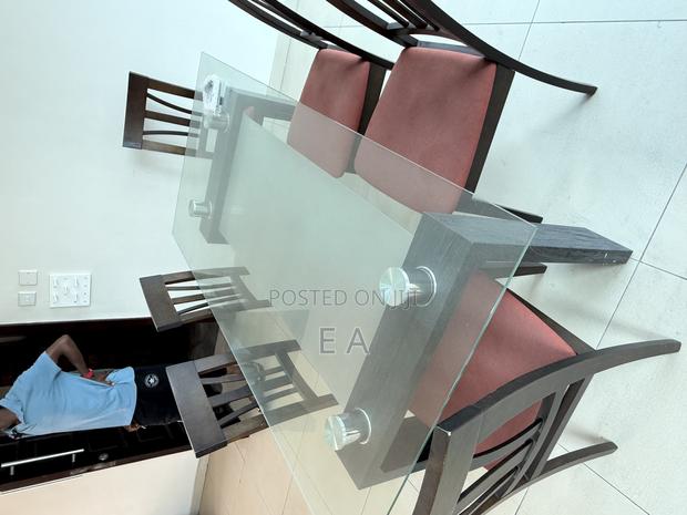Modern Glass-Top Dining Table With 4 Chairs photo 3