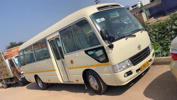 Toyota Coaster 2013 Yellow