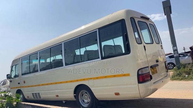 Toyota Coaster 2013 Yellow photo 7