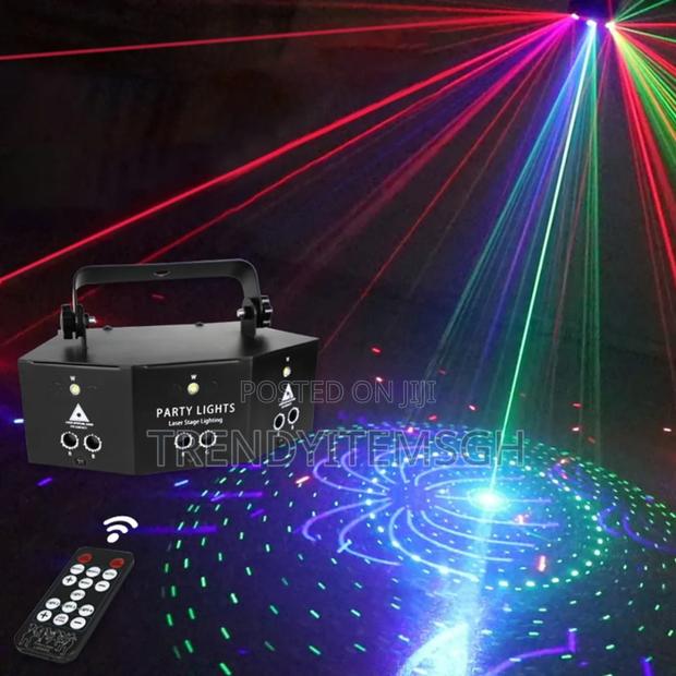 9 Eye Laser Projector Light Strobe Disco Party Light photo 2