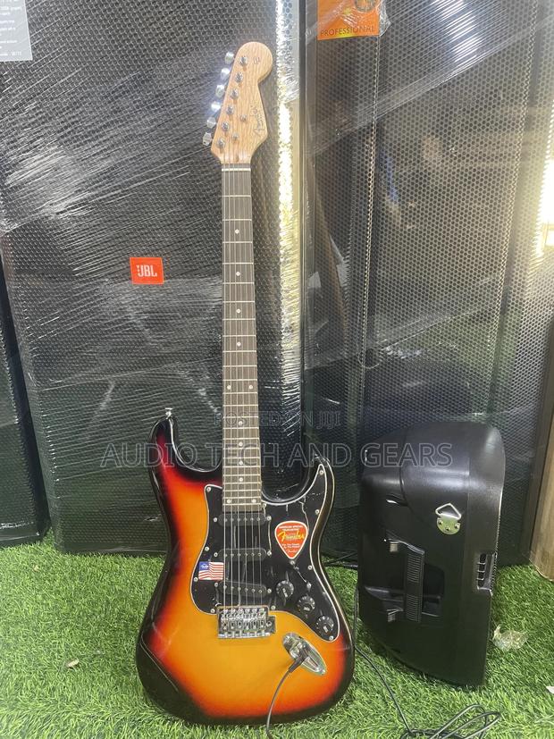 Fender Lead Guitar {Brown} · Photo 3