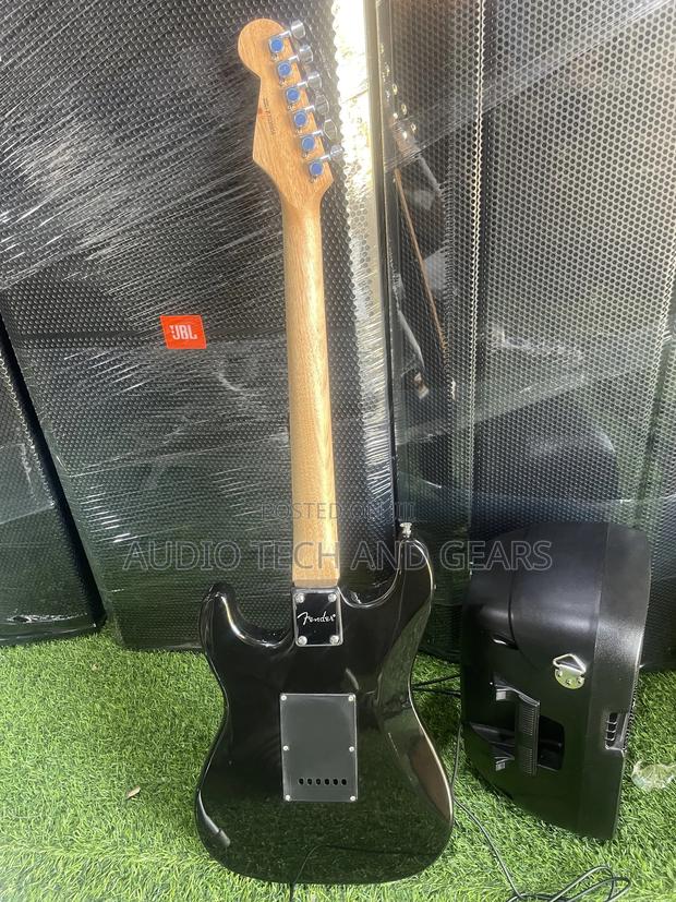 Fender Lead Guitar {Brown} · Photo 4