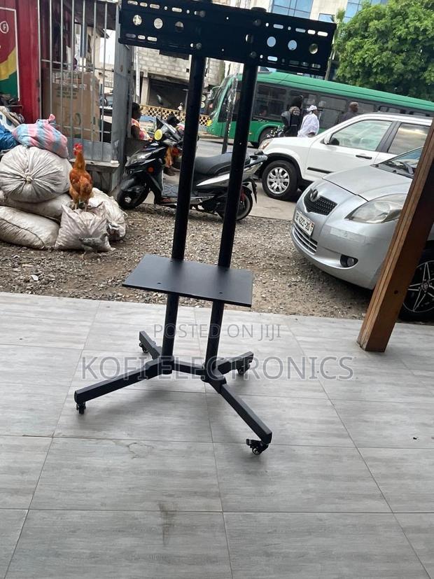 Premium 32–65 Inch Television Stand Stable, Sleek Space-Smart · Photo 2