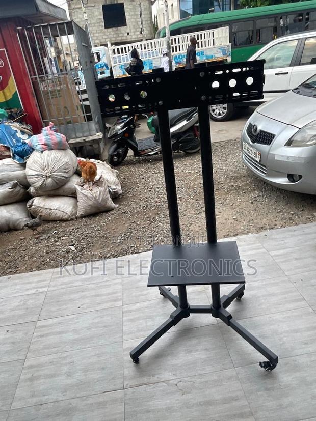 Durable 32–65” Screen Stand Strong, Balanced Industrial-Style · Photo 2