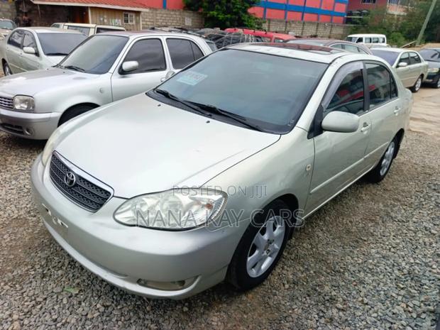 Toyota Corolla LE 4dr Sedan (1.8L 4cyl 4A) 2010 Gold photo 2