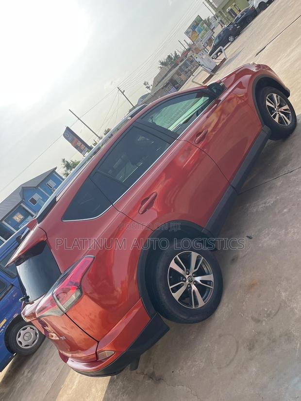 Toyota RAV4 XLE AWD (2.5L 4cyl 6A) 2017 Orange photo 6