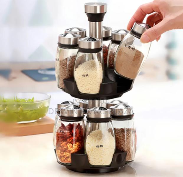 12 PCS Jar Rotating Spice Rack · Photo 1