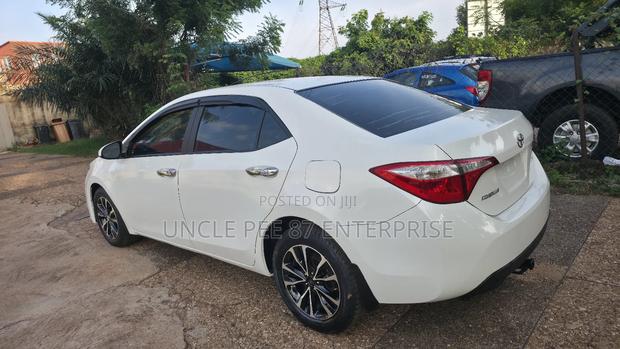 Toyota Corolla LE Eco 4dr Sedan (1.8L 4cyl CVT) 2015 White photo 5