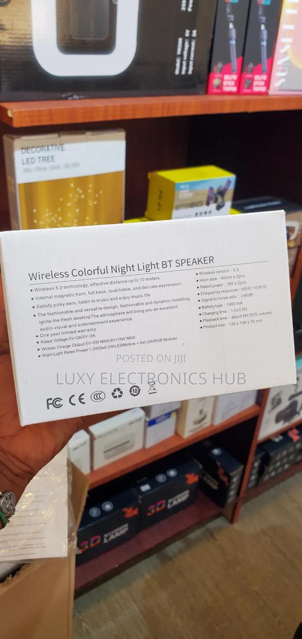 Bluetooth Speaker With Alarm Clock and Wireless Charger photo 6