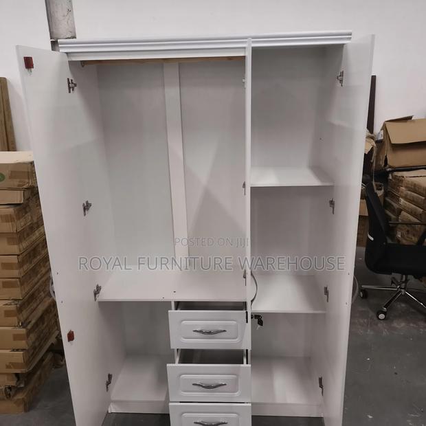 Modern White Three-Door Wardrobe photo 2