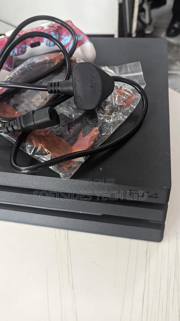 Powerful Playstation 4 Pro, 1tb Console Comes With 2 Pads And 17 Games photo 2