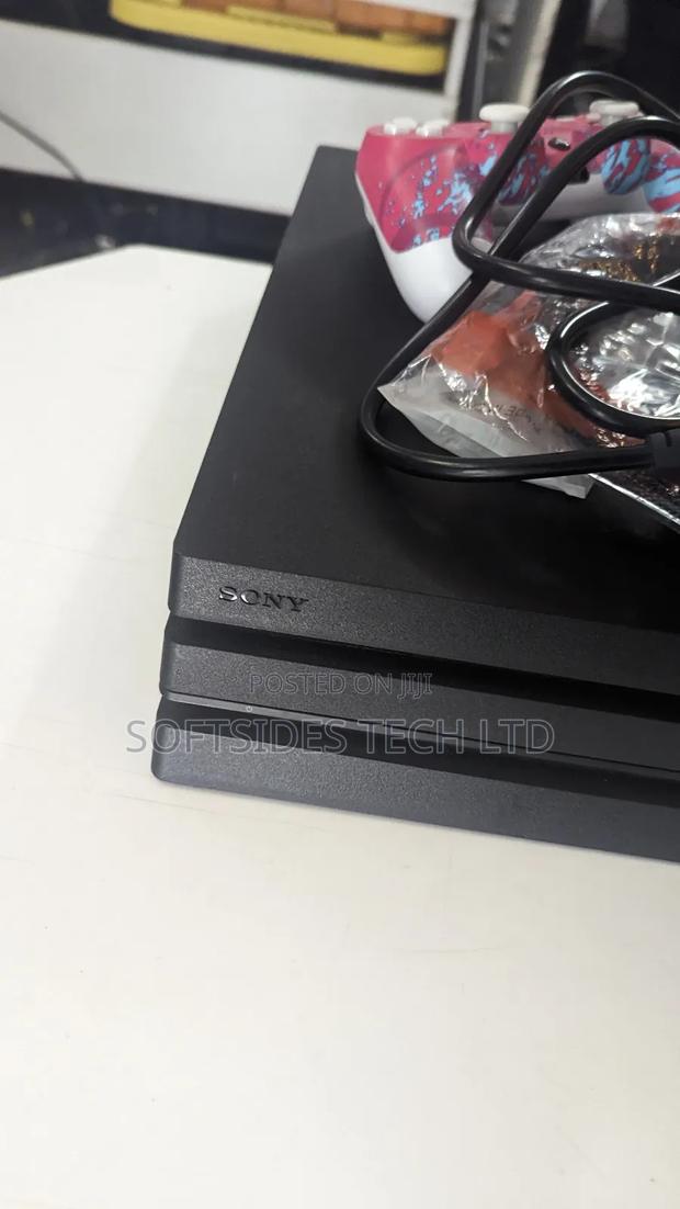 Powerful Playstation 4 Pro, 1tb Console Comes With 2 Pads And 17 Games photo 3