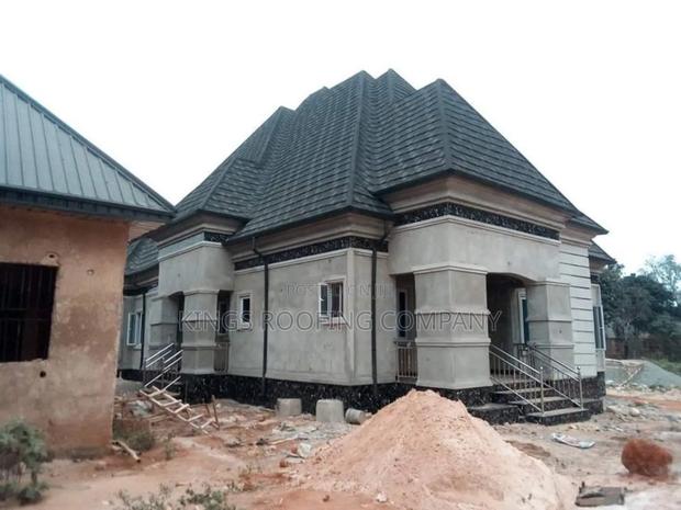 Big House Roofed With Shingle Euro Roofing Tiles · Photo 2
