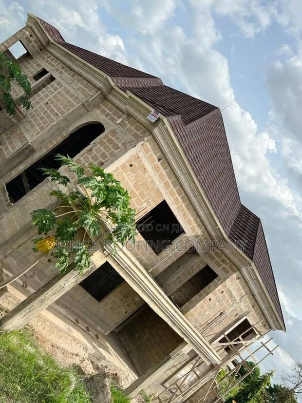 Fully Roofed House With Shingle Euro Roofing Tiles · Photo 2