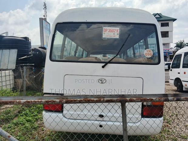 Toyota Coaster 2018 White photo 3