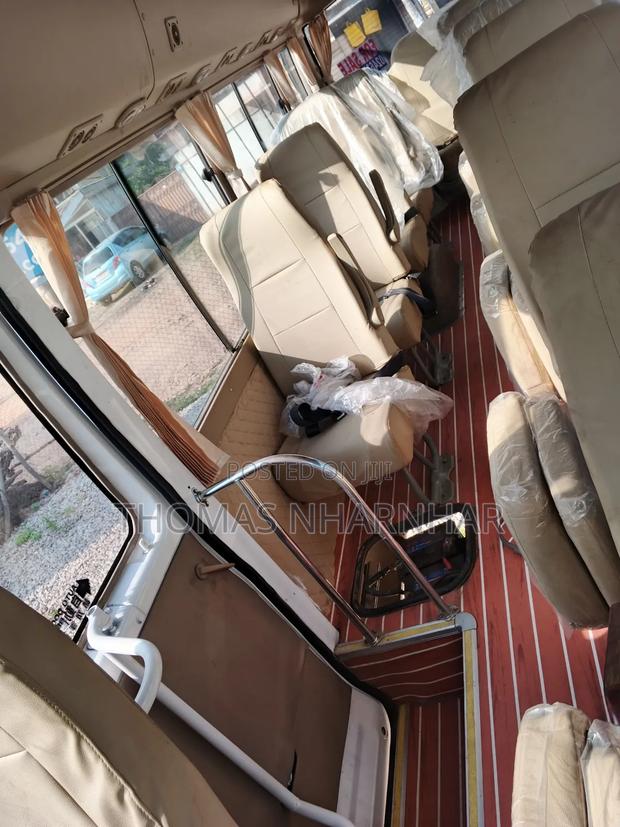 Toyota Coaster 2018 White photo 9