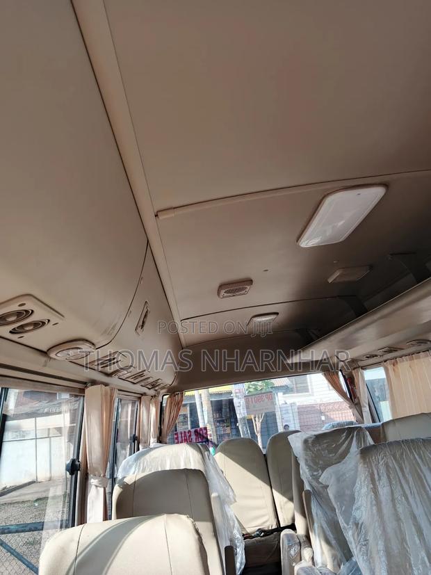 Toyota Coaster 2018 White photo 10
