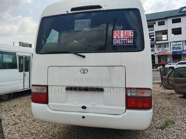 Toyota Coaster 2018 White photo 2