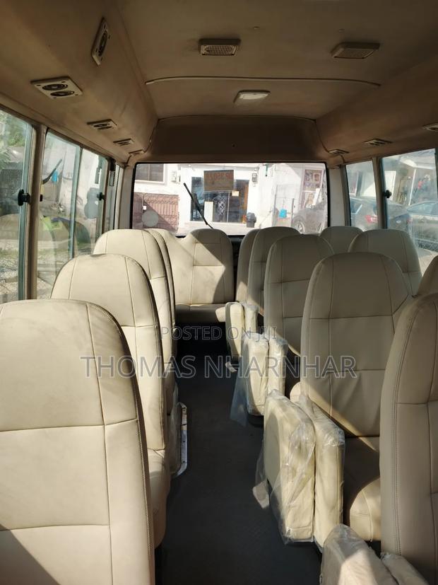 Toyota Coaster 2018 White photo 7