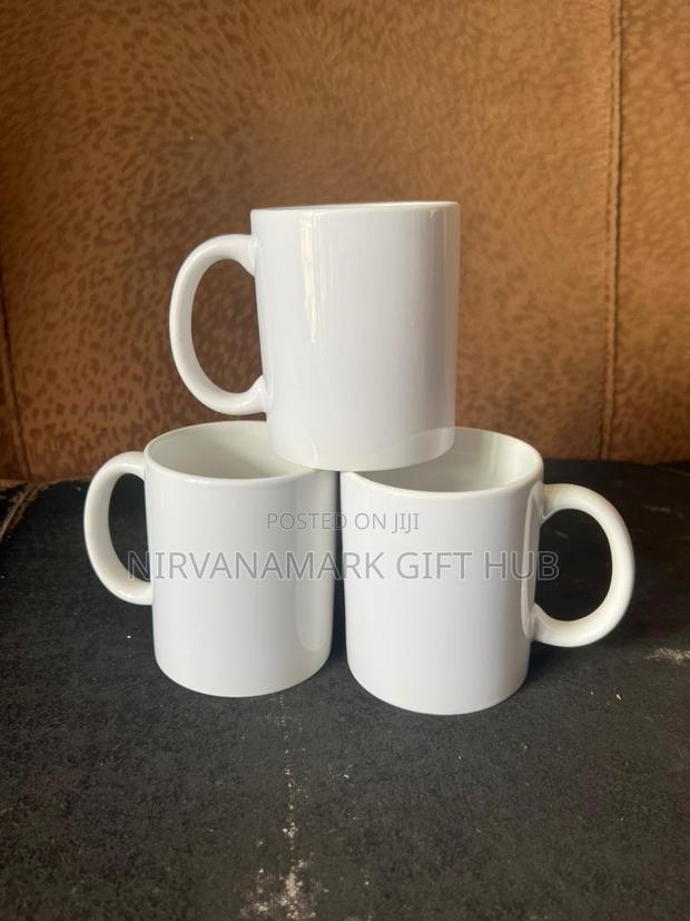 White and Magic Ceramic Mugs photo 5