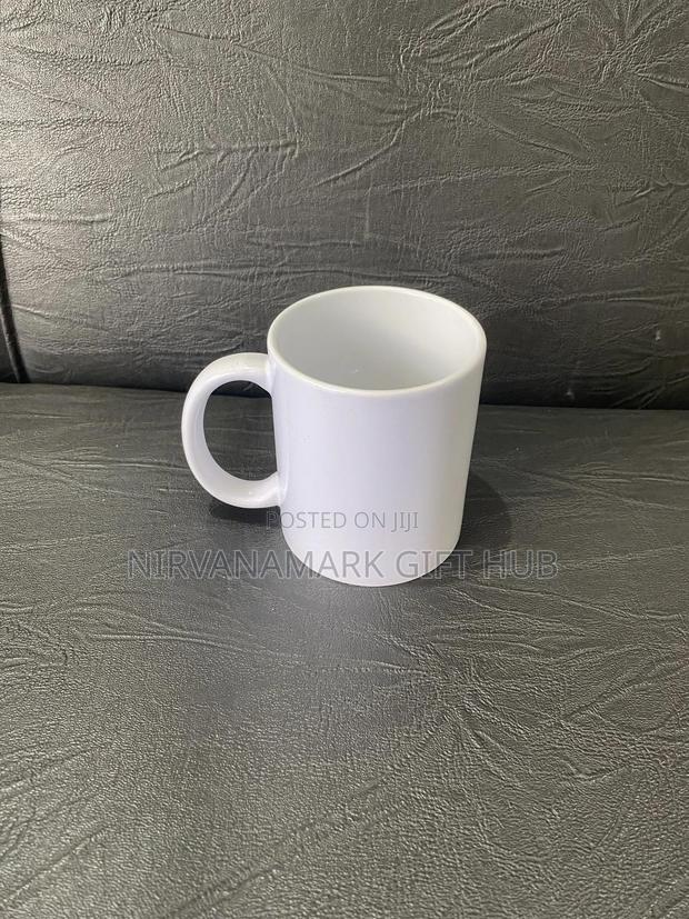 White and Magic Ceramic Mugs photo 2