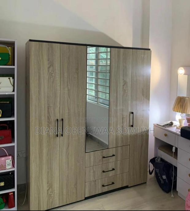 Three in One Wardrobe With Three Drawers Which Has Mirror