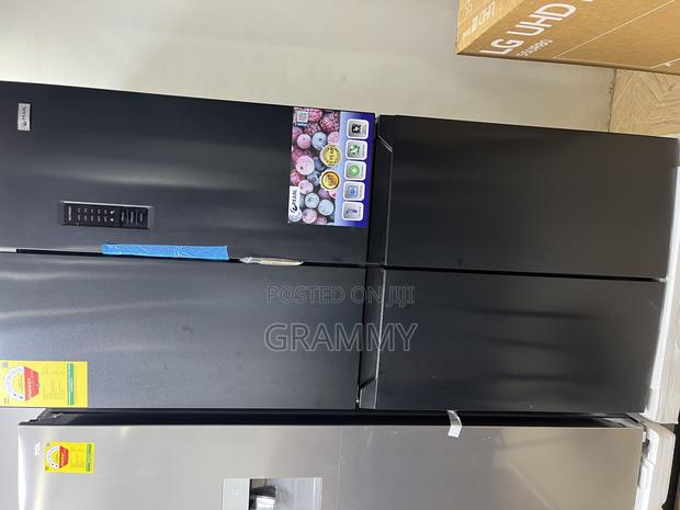 Side-by-Side Upper Doors With Bottom Freezer Drawers