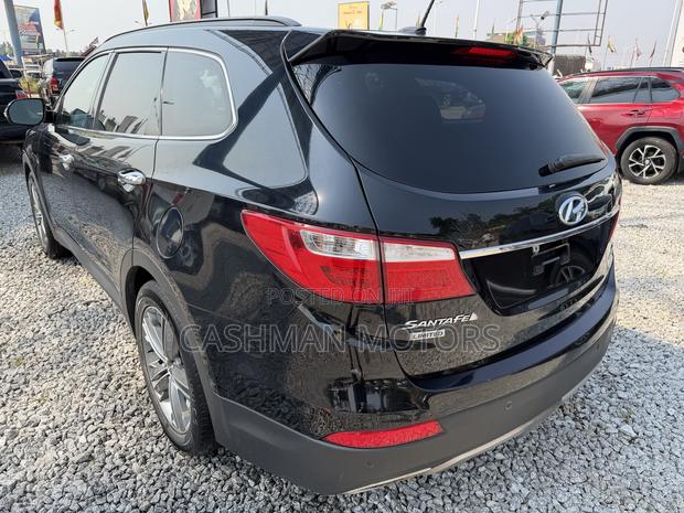 Hyundai Santa Fe Limited w/Saddle Interior 4dr SUV AWD (3.3L 6cyl 6A)