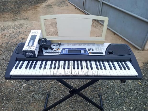 Yamaha Ez- 150 With Keyboard Bag, Adapter, Bookrest Sustain Pedal