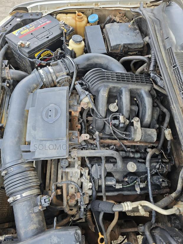 Nissan Frontier Crew Cab LE 4x4 2010 Silver