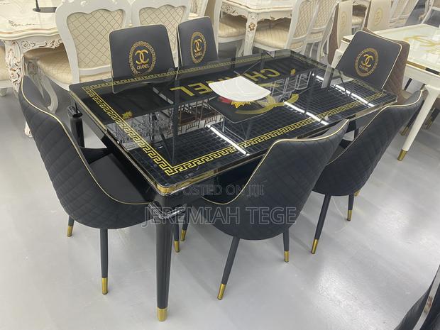 Quality Classic Dining Set With Glossy Glass Top