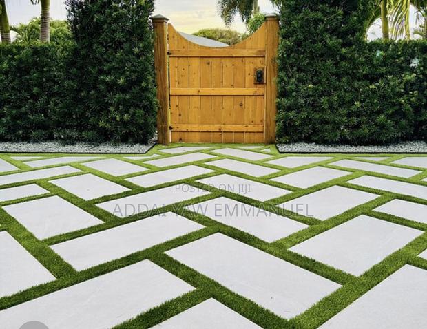 Artificial Grass and Concrete Pavers
