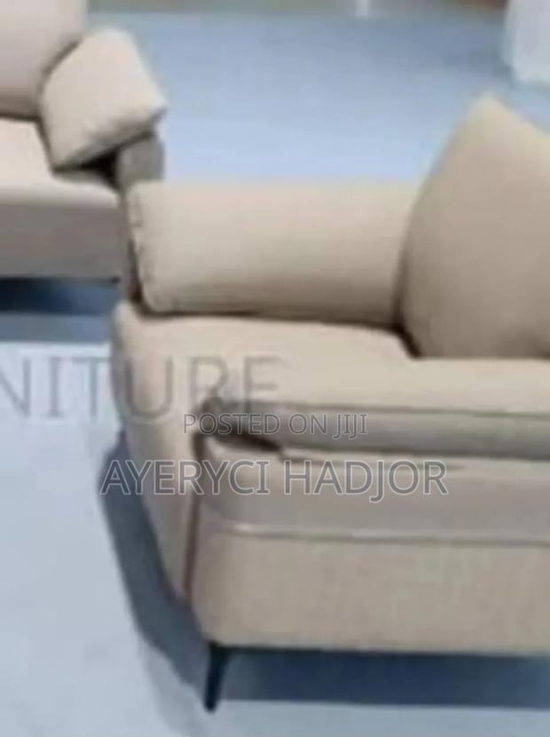 An Elegant Grey Single Sofa
