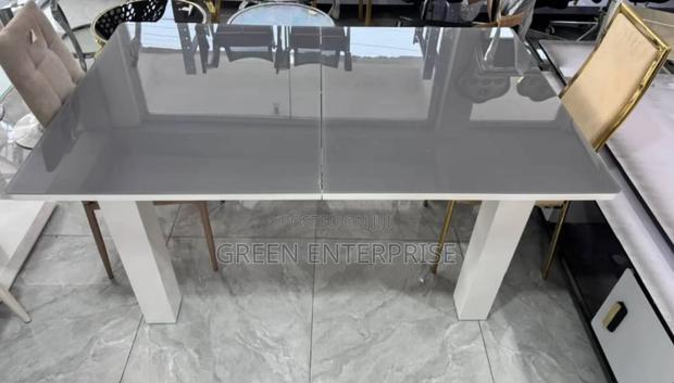 Contemporary High Gloss MDF Dining Table With White Base