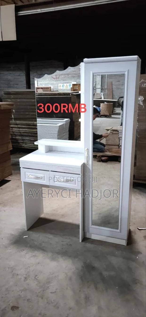 A Modern Full Length Mirror With Drawer