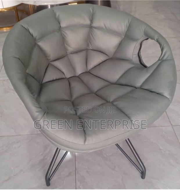 Modern Round Lounge Chair With a Unique Cutout Design