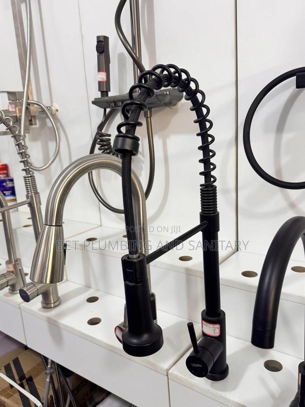 Hot And Cold Pull Out Sink Tap _black And Gold Sink Tap · Photo 4