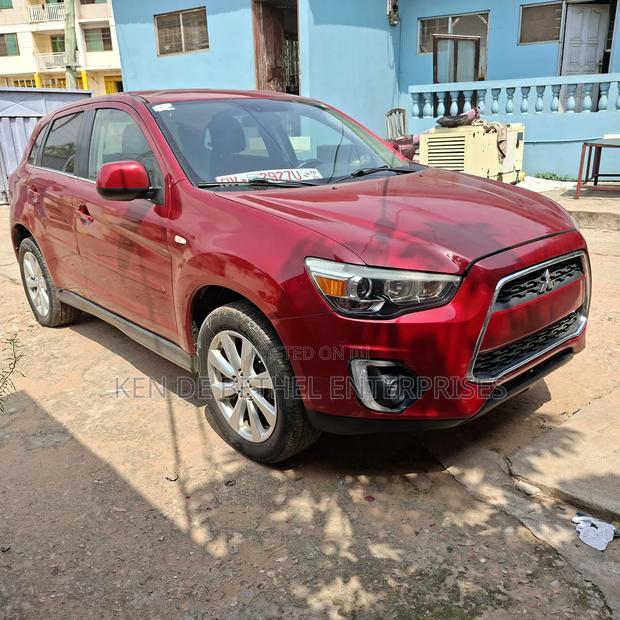 Mitsubishi Outlander SE 4dr SUV (2.4L 4cyl CVT) 2015 Red photo 2