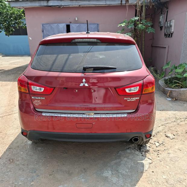 Mitsubishi Outlander SE 4dr SUV (2.4L 4cyl CVT) 2015 Red photo 3