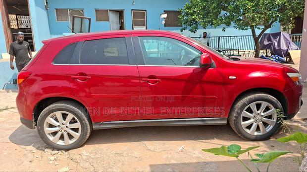 Mitsubishi Outlander SE 4dr SUV (2.4L 4cyl CVT) 2015 Red photo 7