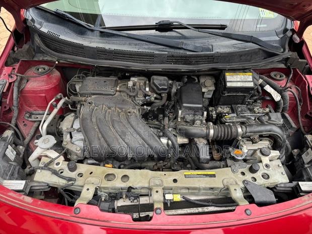 Nissan Versa 1.6 S 4dr Sedan (1.6L 4cyl 4A) 2015 Red photo 9