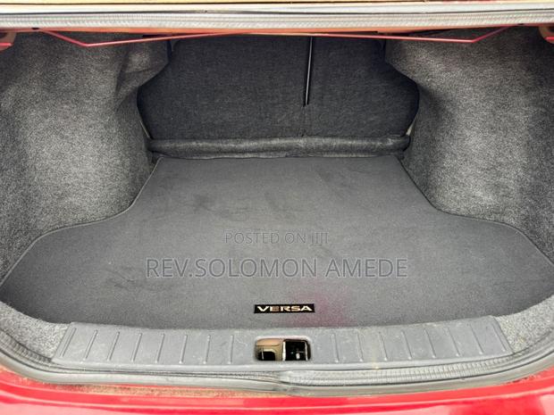 Nissan Versa 1.6 S 4dr Sedan (1.6L 4cyl 4A) 2015 Red photo 12