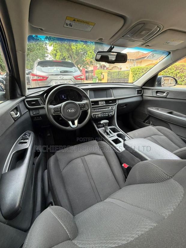 Blue Kia Optima for Rent photo 4