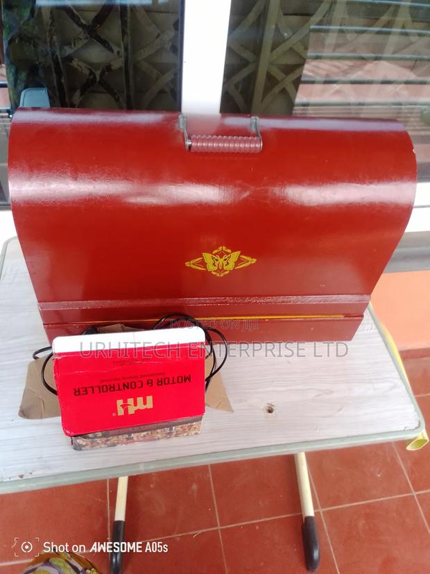 Butterfly Manual Sewing Machine And Electronic Motor photo 2
