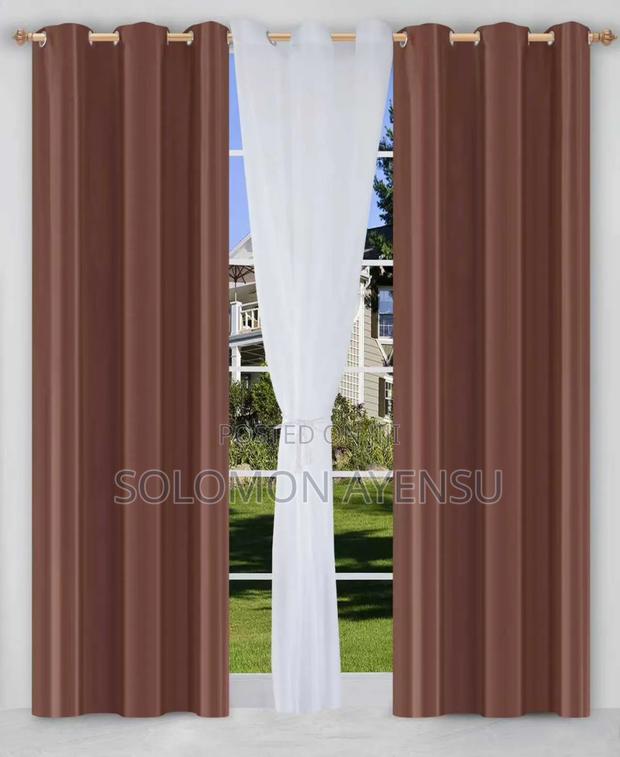 Gold/Amber Sunblock Curtains and White Voile Sheer Curtains. photo 2