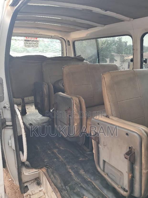 Nissan Caravan (Urvan) 2013 White photo 2