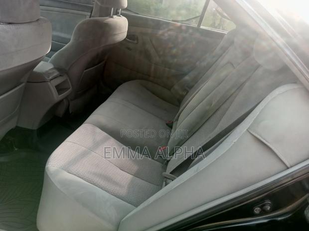 Toyota Camry LE 4dr Sedan (2.5L 4cyl 6A) 2011 Black photo 4