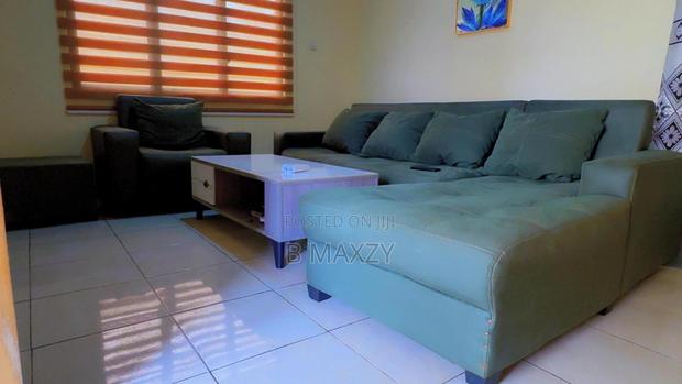 Elegant L-Shaped Sofa Set With Single Sofa Center Table