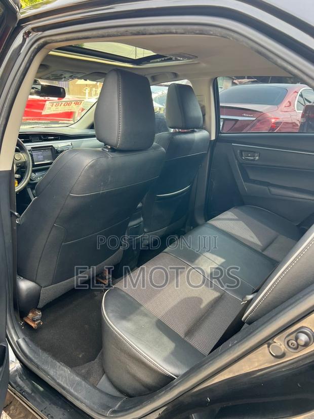 Toyota Corolla L 4dr Sedan (1.8L 4cyl 6M) 2015 Black photo 7
